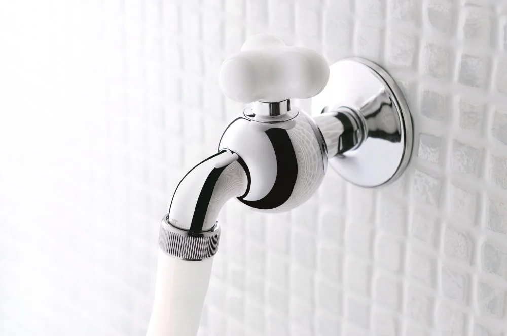 JUSTIME STORY Bib Tap with Spherical Body, Cloud-Inspired Ceramic Handle and Concealed Valve Design